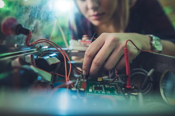 Gulmay electrician servicing a high-power x-ray generator